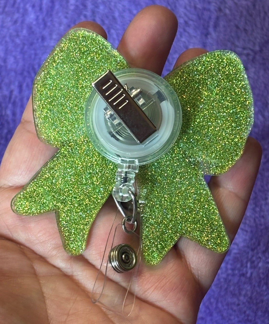 Mardi Gras Themed Bow Badge Reel