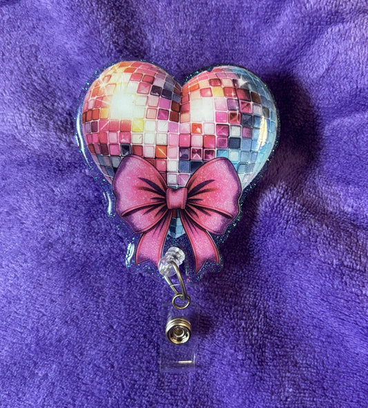 Disco Heart with a Bow Badge Reel