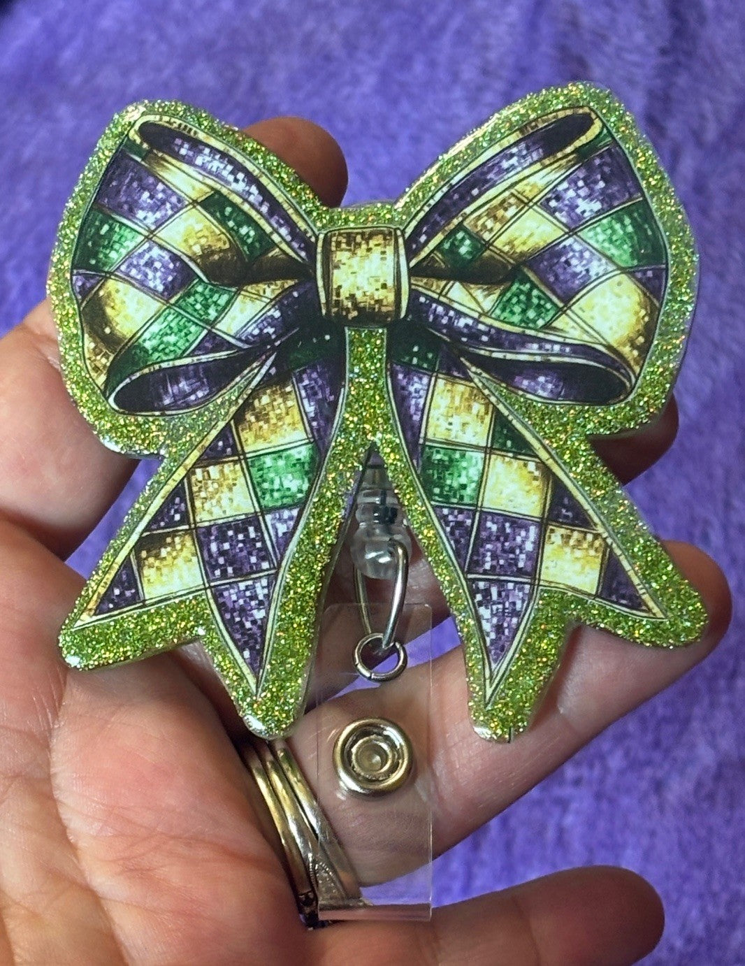 Mardi Gras Themed Bow Badge Reel