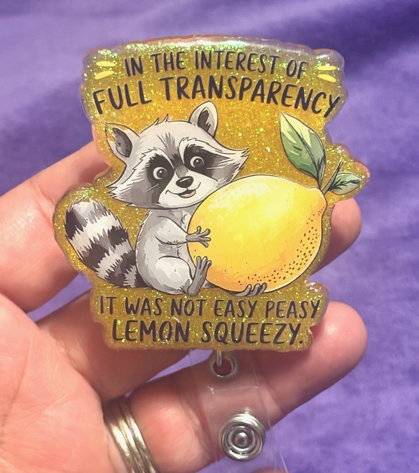 Racoon with a Lemon Badge Reel with an Alligator Clip