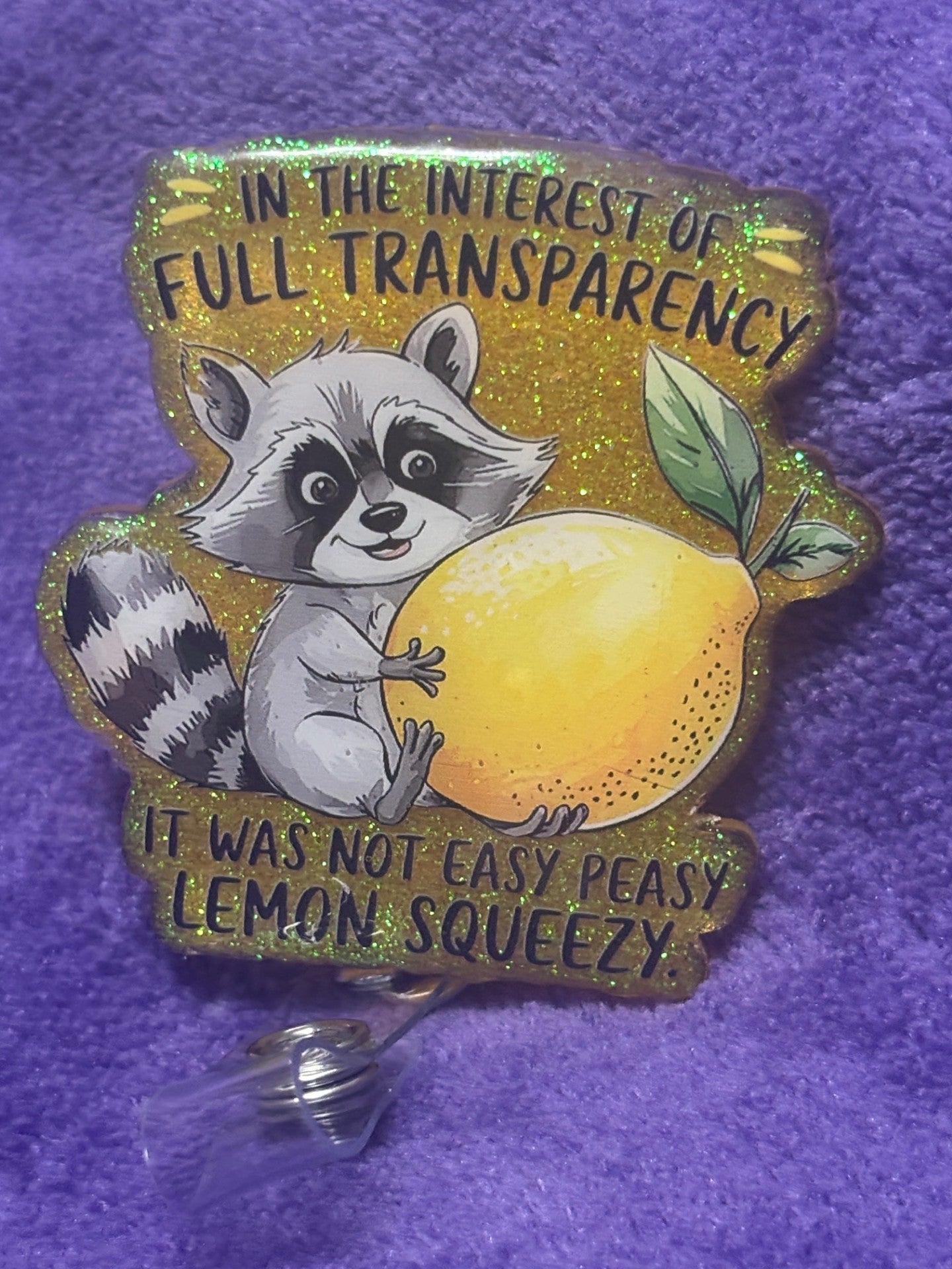Racoon with a Lemon Badge Reel with an Alligator Clip